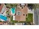 Aerial view of a home with a private backyard featuring a sparkling pool, lush landscaping, and a patio area at 3361 Iberia St, Las Vegas, NV 89146