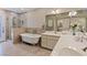 Elegant bathroom features a clawfoot tub, tiled shower, and ample vanity space at 3361 Iberia St, Las Vegas, NV 89146