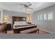 Comfortable bedroom features plantation shutters, neutral color scheme, and plush bedding at 3361 Iberia St, Las Vegas, NV 89146