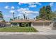 Charming single-story home with well-manicured lawn and a spacious two-car garage at 3361 Iberia St, Las Vegas, NV 89146