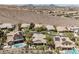 Bird's-eye view of homes offering outdoor amenities, nestled near scenic mountain views at 40 Stonemark Dr, Henderson, NV 89052