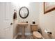 Bathroom featuring a pedestal sink and tiled floors at 40 Stonemark Dr, Henderson, NV 89052
