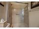 Bathroom with glass shower doors at 40 Stonemark Dr, Henderson, NV 89052