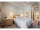Comfortable bedroom featuring ceiling fan and ensuite bathroom at 40 Stonemark Dr, Henderson, NV 89052