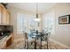 Breakfast nook with tile flooring, wooden cabinets, and plantation shutters at 40 Stonemark Dr, Henderson, NV 89052