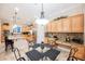 Eat-in kitchen area featuring a glass dining table and a built-in workstation along the back wall at 40 Stonemark Dr, Henderson, NV 89052