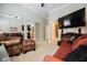 Living room with a mounted TV and sliding mirror closet doors at 40 Stonemark Dr, Henderson, NV 89052