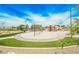 Playground and recreational area offers swings, slides, and open space for outdoor activities at 40 Stonemark Dr, Henderson, NV 89052