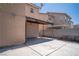 Rear exterior of the home showing a large backyard patio area at 4945 Volcanic Rock Ln, Las Vegas, NV 89122