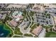 Aerial view showcasing the community's amenities, including the pool, clubhouse, and parking areas at 5341 E La Campana Dr, Pahrump, NV 89061