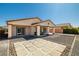 Inviting backyard with a stone-paved patio area, perfect for outdoor entertaining at 5341 E La Campana Dr, Pahrump, NV 89061