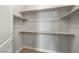 Walk-in closet with shelving and rod for hanging clothes; ready to store and organize your wardrobe at 5341 E La Campana Dr, Pahrump, NV 89061