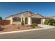 Charming single-story home with a well-manicured front yard and a two-car garage at 5341 E La Campana Dr, Pahrump, NV 89061