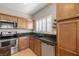A kitchen featuring wood cabinets and stainless steel appliances at 5341 E La Campana Dr, Pahrump, NV 89061