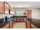 A kitchen with granite countertops and stainless steel appliances at 5341 E La Campana Dr, Pahrump, NV 89061