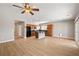 An open floor plan living area with a kitchen featuring an island at 5341 E La Campana Dr, Pahrump, NV 89061