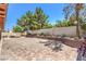 Expansive backyard featuring brick-paved patio area with mature trees providing shade at 5453 Palisades Quad Ave, Las Vegas, NV 89122