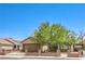 Lovely single-story home with gated front yard, desert landscaping, and two-car garage at 5453 Palisades Quad Ave, Las Vegas, NV 89122