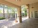 Spacious covered patio offering shade and views of the meticulously landscaped backyard at 601 Summer Mesa Dr, Las Vegas, NV 89144