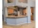 Open concept kitchen features granite counters, wood cabinetry, and breakfast bar at 601 Summer Mesa Dr, Las Vegas, NV 89144
