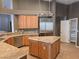 Well-equipped kitchen with a large center island, stainless steel appliances, and ample countertop space at 601 Summer Mesa Dr, Las Vegas, NV 89144