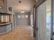 Open living space featuring tiled flooring, recessed lighting, and access to an outdoor space at 601 Summer Mesa Dr, Las Vegas, NV 89144