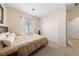Cozy bedroom with sliding closet doors and neutral-toned decor at 6114 Saddle Horse Ave, Las Vegas, NV 89122