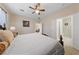 Comfortable main bedroom with ceiling fan and easy access to the bathroom at 6114 Saddle Horse Ave, Las Vegas, NV 89122