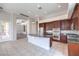 Gourmet kitchen with stainless steel appliances, granite countertops and center island at 6821 Sleepy Pine St, Las Vegas, NV 89130
