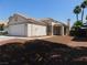 Charming single-story home with well-maintained landscaping and a classic desert aesthetic in a residential neighborhood at 7542 Mycroft Ct, Las Vegas, NV 89147
