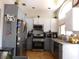 Well-equipped kitchen with stainless steel appliances, granite countertops, and ample cabinet space at 7542 Mycroft Ct, Las Vegas, NV 89147