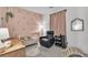 Charming Bedroom with crib, cozy recliner, decorative wall decals and decor at 7706 Crystal Village Ln, Las Vegas, NV 89113