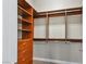 Walk-in closet with wooden shelves and drawers for optimal storage at 8209 Chapelle Ct, Las Vegas, NV 89131