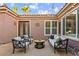 Cozy courtyard featuring stylish seating, decorative pavers, string lights, and a relaxing outdoor ambiance at 8209 Chapelle Ct, Las Vegas, NV 89131