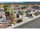 Lovely aerial view of single-story home with desert landscaping, tile roof, and mountain views at 8537 Highland View Ave, Las Vegas, NV 89145