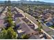 A vibrant aerial view of the neighborhood, showcasing palm trees and well-maintained houses at 8537 Highland View Ave, Las Vegas, NV 89145