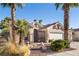 Inviting single-story home with desert landscaping, gated courtyard, and three-car garage at 8537 Highland View Ave, Las Vegas, NV 89145