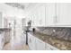 Kitchen with granite counters, pendant lighting, and sleek appliances at 8537 Highland View Ave, Las Vegas, NV 89145