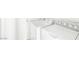 Clean and bright laundry room with white washer and dryer at 8537 Highland View Ave, Las Vegas, NV 89145