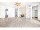 Open concept living room with stone fireplace and built in shelves at 8537 Highland View Ave, Las Vegas, NV 89145