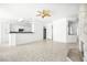 Spacious living room with breakfast bar and fireplace at 8537 Highland View Ave, Las Vegas, NV 89145
