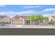 Charming single-story home featuring a well-maintained front yard and attached two-car garage at 8924 Signal Terrace Dr, Las Vegas, NV 89134