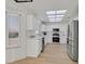 Modern kitchen featuring white cabinets, stainless steel appliances, and beautiful countertops at 8924 Signal Terrace Dr, Las Vegas, NV 89134
