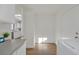 Practical laundry room featuring updated appliances, storage cabinets, and bright lighting at 8924 Signal Terrace Dr, Las Vegas, NV 89134