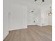 Bright living room featuring laminated floors and recessed lighting fixtures with high vaulted ceilings at 8924 Signal Terrace Dr, Las Vegas, NV 89134