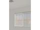 White framed window with blinds at 8924 Signal Terrace Dr, Las Vegas, NV 89134