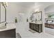 Elegant bathroom with double sinks and contemporary fixtures at 8992 Sparkling River Ct, Las Vegas, NV 89178
