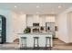 Stylish kitchen with an island, stainless appliances, recessed lighting, and ample cabinet space at 9357 Aria Ridge Ave, Las Vegas, NV 89143