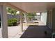 Covered back patio leading to hot tub and landscaped backyard, ideal for relaxing or entertaining at , Las Vegas, NV 89130