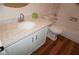 Bathroom vanity has white cabinets and stone counter-top with white bowl sink at , Las Vegas, NV 89130